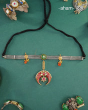 Crafted with precision and elegance, our Noori Two Tone Silver Neckpiece showcases n a dual tone of silver and gold. Made from 92.5 silver, this exquisite piece exudes sophistication and timeless beauty. Elevate your look with this stunning neckpiece.