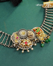 One of a kind statement wearable art pieces.&nbsp;An eclectic mix of elements, with a play of colours, textures, forms and workmanship. Crafted in Silver with two tones and kundan highlights and beautiful cultured pearls that makes this neckpiece so versatile and unique. Modern Heirloom pieces that can be worn across generations.