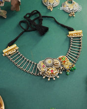 One of a kind statement wearable art pieces.&nbsp;An eclectic mix of elements, with a play of colours, textures, forms and workmanship. Crafted in Silver with two tones and kundan highlights and beautiful cultured pearls that makes this neckpiece so versatile and unique. Modern Heirloom pieces that can be worn across generations.