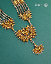 Enhance your style with the timeless elegance of the Dual Tone Silver Neckpiece. Handcrafted by skilled karigars in Barmer, Rajasthan, this earring features traditional Bandhel work, where a thin sheet of hand beaten&nbsp;22 carat gold is fused with 92.5 silver and then set on 92.5 silver using a unique wax filling technique. A classic representation of Indian craftsmanship.&nbsp;