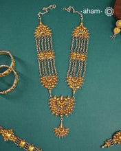 Enhance your style with the timeless elegance of the Dual Tone Silver Neckpiece. Handcrafted by skilled karigars in Barmer, Rajasthan, this earring features traditional Bandhel work, where a thin sheet of hand beaten&nbsp;22 carat gold is fused with 92.5 silver and then set on 92.5 silver using a unique wax filling technique. A classic representation of Indian craftsmanship.&nbsp;