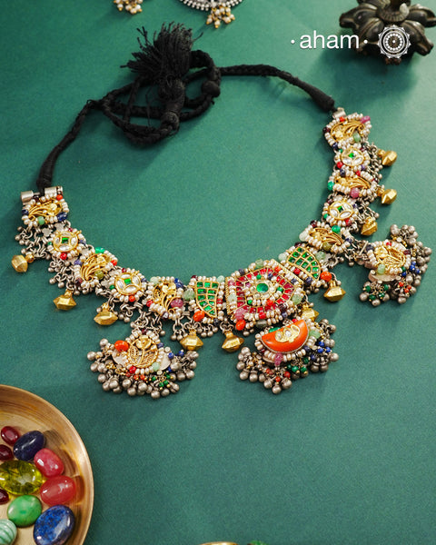 One of a kind statement wearable art pieces.An eclectic mix of elements, with a play of colours, textures, forms and workmanship. Crafted in Silver with two tones and kundan highlights and beautiful cultured pearls that makes this neckpiece so versatile and unique. Modern Heirloom pieces that can be worn across generations.