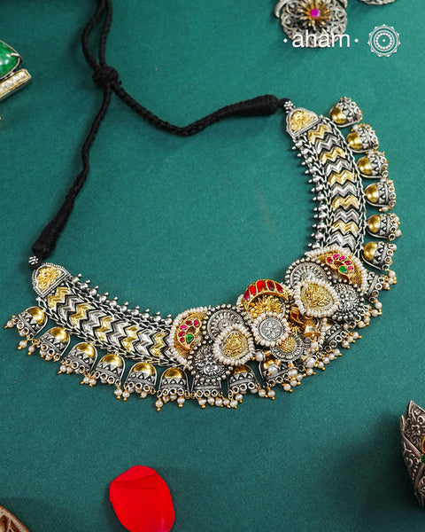 One of a kind statement wearable art pieces. An eclectic mix of elements, with a play of colours, textures, forms and workmanship. Crafted in Silver with two tones and kundan highlights and beautiful cultured pearls that makes this neckpiece so versatile and unique. Modern Heirloom pieces that can be worn across generations.
