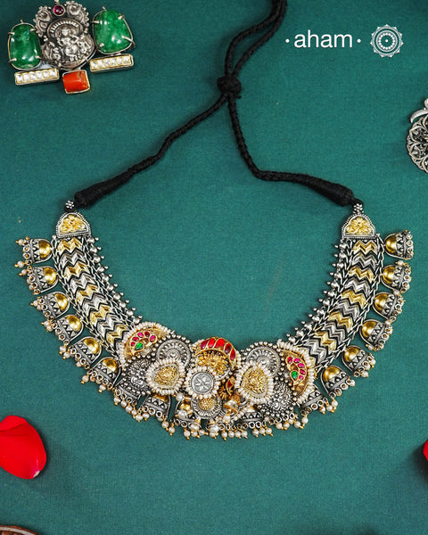 One of a kind statement wearable art pieces. An eclectic mix of elements, with a play of colours, textures, forms and workmanship. Crafted in Silver with two tones and kundan highlights and beautiful cultured pearls that makes this neckpiece so versatile and unique. Modern Heirloom pieces that can be worn across generations.
