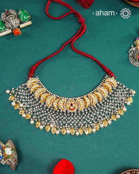 One of a kind statement wearable art pieces. An eclectic mix of elements, with a play of colours, textures, forms and workmanship. Crafted in Silver with two tones and kundan highlights and beautiful cultured pearls that makes this neckpiece so versatile and unique. Modern Heirloom pieces that can be worn across generations.