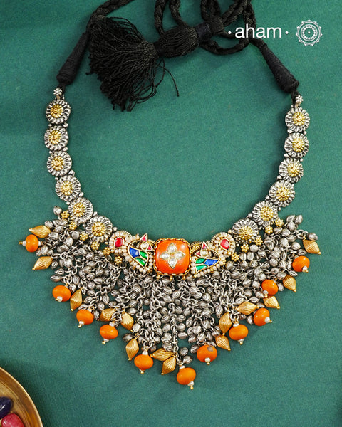 One of a kind statement wearable art pieces.An eclectic mix of elements, with a play of colours, textures, forms and workmanship. Crafted in Silver with two tones and kundan highlights and beautiful cultured pearls that makes this neckpiece so versatile and unique. Modern Heirloom pieces that can be worn across generations.