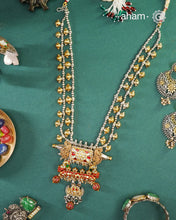 One of a kind statement wearable art pieces.An eclectic mix of elements, with a play of colours, textures, forms and workmanship. Crafted in Silver with two tones and kundan highlights and beautiful cultured pearls that makes this neckpiece so versatile and unique. Modern Heirloom pieces that can be worn across generations.