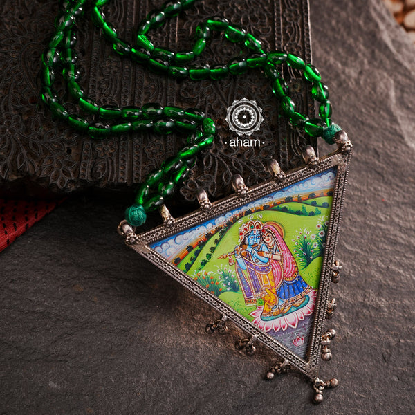 Hand Painted Radha Krishna Neckpiece with beautiful green beads. These are wearable art pieces. Each unique and one of a kind. 