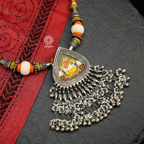 Stunning Neckpiece with handpainted miniature Ganesha painting encased in sterling silver with pearl hanging and the most beautiful powai that adds so much charm to the whole neckpiece.