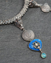 Flaunt this beautiful Ira neckpiece with an elegant nandi motif. Beautiful, handcrafted 92.5 sterling silver necklace with semi precious beads and kundan work floral motif. Looks great with both ethnic and western outfits.

Nandi&nbsp;which means “giving delight” or “giving joy,”&nbsp;is the sacred bull of god Shiva, one of the most important gods in the Hindu mythology.&nbsp;