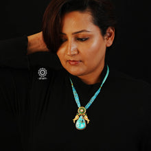 This Ira Turquoise Drop Silver Neckpiece is perfect for any special occasion. Featuring a turquoise drop and two kundan work birds for added detail, this dual tone neckpiece is as versatile as it is stylish. Wear it short or long - the choice is yours.