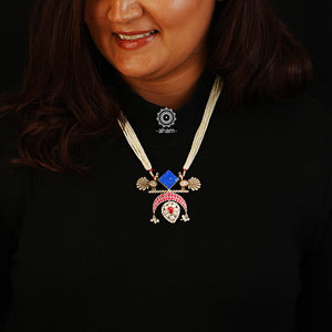 Make an 'irresistible' style statement with this one of a kind necklace! Adorn yourself with this unique peacock pendant, bedazzled with glittering kundan and topped off with the perfect pearl strands. Time to get your 'peacock pride' on!