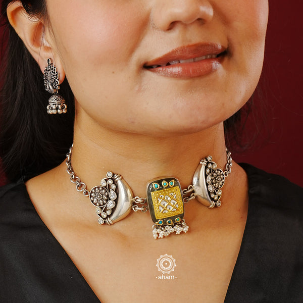 Flaunt this beautiful Ira Choker with intricate floral work. Beautiful, handcrafted silver necklace with inlay work on semi precious stone. Looks great with both ethnic and western outfits.