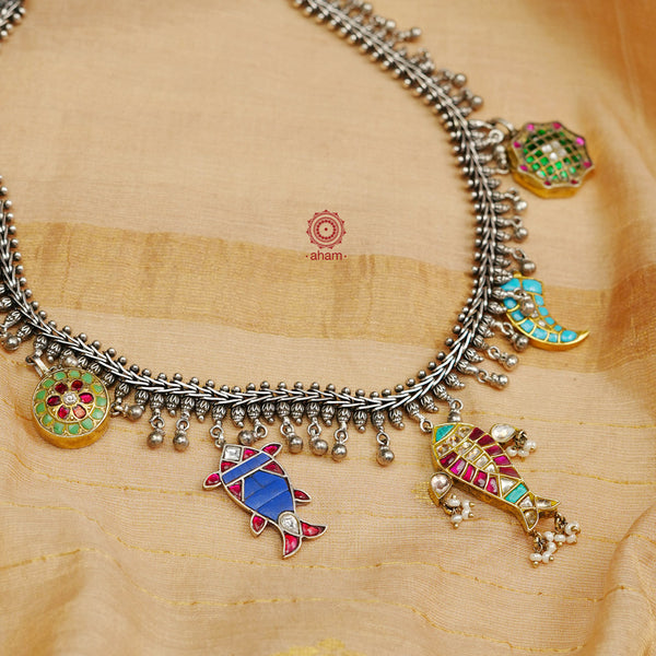 Flaunt this beautiful two tone Ira neckpiece with intricate floral work. Beautiful, handcrafted 92.5 sterling silver necklace with semi precious beads. Looks great with both ethnic and western outfits. 