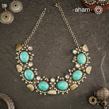 Flaunt beautiful Ira turquoise semi precious stone, neckpiece which can be worn as a short neckpiece or even a choker. Handcrafted in 92.5 sterling silver.