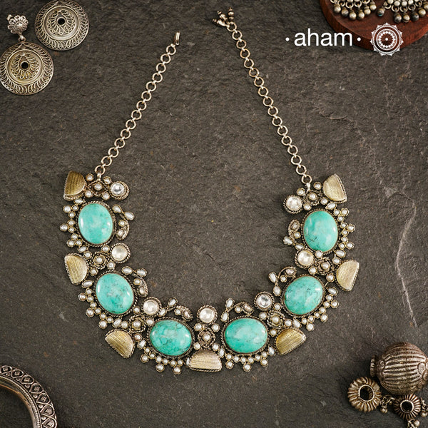 Flaunt beautiful Ira turquoise semi precious stone, neckpiece which can be worn as a short neckpiece or even a choker. Handcrafted in 92.5 sterling silver.