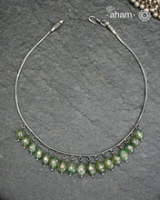 Elegant Silver neckpiece crafted in 92.5 silver with green emerald with inlay work.&nbsp;