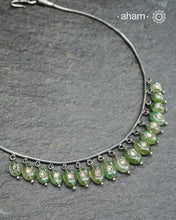 Elegant Silver neckpiece crafted in 92.5 silver with green emerald with inlay work.