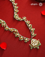 This delicate neckpiece showcases expertly set moissanite stones that capture the brilliance of genuine diamonds. Crafted from 92.5% sterling silver with a luxurious gold polish, it is accented with fine pearls to enhance its refined elegance. A sophisticated accessory designed for those who appreciate subtle luxury and meticulous craftsmanship.