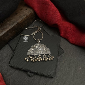 Mewad pendant with intricate floral work. Crafted in 92.5 sterling silver. Wear it with a long chain on your formal Indian wear to complete your work look. (Does not include chain).