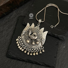 Mewad Lotus pendant with beautiful peacock motif. Crafted in 92.5 sterling silver. Wear it with a long chain on your Indian wear to complete your work look. (Does not include chain).