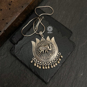 Mewad Lotus pendant with beautiful elephant motif. Crafted in 92.5 sterling silver. Wear it with a long chain on your Indian wear to complete your work look. (Does not include chain).