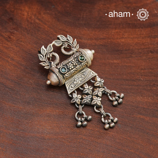 This classic silver pendant features beautifully detailed peacocks and is handcrafted in 92.5 silver by skilled artisans from Rajasthan. Enhance your professional look with this exquisite piece.
(Does not include chain)