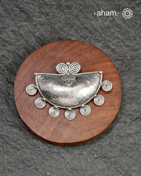 Mewad silver pendant crafted in 92.5 silver with beaten texture. Wear it with a wire hasli, or a black thread. Perfect to wear to work or a casual evening out. 