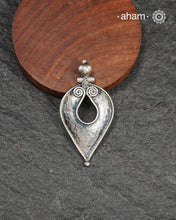 Mewad silver pendant crafted in 92.5 silver with beaten texture. Wear it with a wire hasli, or a black thread. Perfect to wear to work or a casual evening out.