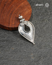 Mewad silver pendant crafted in 92.5 silver with beaten texture. Wear it with a wire hasli, or a black thread. Perfect to wear to work or a casual evening out.