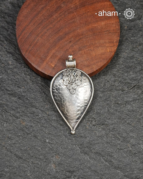 Mewad silver pendant crafted in 92.5 silver with beaten texture. Wear it with a wire hasli, or a black thread. Perfect to wear to work or a casual evening out.