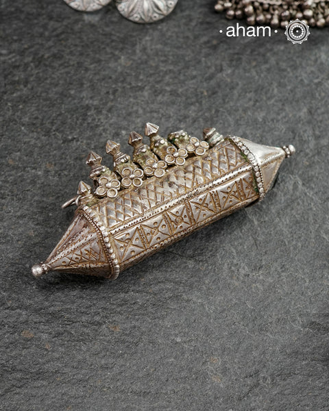 Vintage Silver Pendant. Beautiful handcrafted pendant from a bygone area, that bring back memories and stories of that time. Wear it with a long chain or with a black thread, or layer them with to create a distinct look.
Region: South of India
