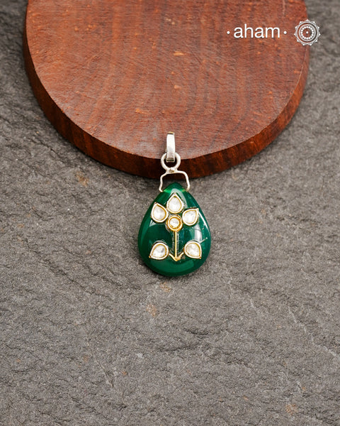 Green quartz with silver inlay work.