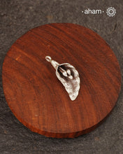 Little charm pendant crafted in 925 silver.