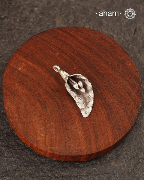 Little charm pendant crafted in 925 silver.