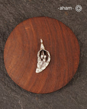 Little charm pendant crafted in 925 silver.