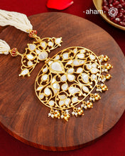 A large statement mother of pearl pendant crafted in 92.5 silver with gold polish.
Comes with strands of Faux pearls.
