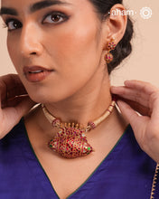 Festive 92.5 sterling silver pendant with beautiful nature inspired motifs. Handcrafted by skilful artisans, enhanced with semi precious stones and gold polish. Comes with a golden cord.Chain not included.