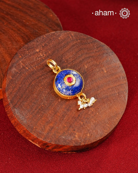 Lapiz stone pendant with inlay work and laced with pearls, set in 92.5 silver with fine gold polish.