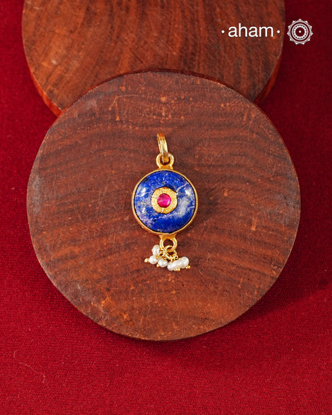 Lapiz stone pendant with inlay work and laced with pearls, set in 92.5 silver with fine gold polish.