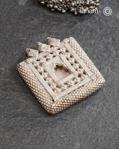 Beautiful handcrafted tribal silver Jharokha pendant from a bygone area, that bring back memories and stories of that time. Wear it with a long chain or with a black thread, or layer them to create a distinct look.