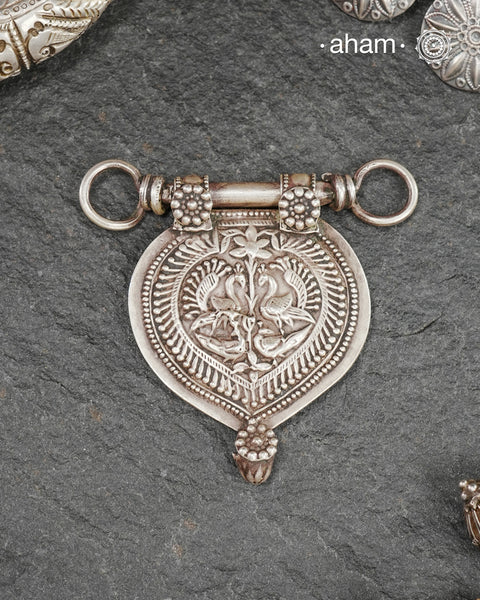 Beautiful handcrafted tribal silver amulet pendant from a bygone area, that bring back memories and stories of that time.&nbsp;Wear it with a long chain or with a black thread, or layer them to create a distinct look.&nbsp;