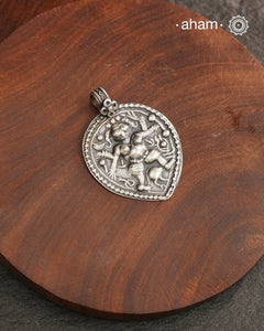 Discover the charm of traditional craftsmanship with our Handmade 92.5 Sterling Silver Kal Bhairav Amulet Pendant. Expertly crafted using the thapi (stamp die) technique, this pendant reflects the age-old artistry of India’s tribal communities. Known by various names like Kavach, Mandaliya, Patri, and Kathla, amulet pendants have long been cherished as symbols of passive worship—a way to keep your deity, Kuldevta, or Kuldevi close to your heart. Traditionally worn on a cord or silver chain.