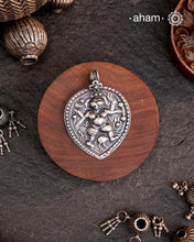Discover the charm of traditional craftsmanship with our Handmade 92.5 Sterling Silver Kal Bhairav Amulet Pendant. Expertly crafted using the thapi (stamp die) technique, this pendant reflects the age-old artistry of India’s tribal communities. Known by various names like Kavach, Mandaliya, Patri, and Kathla, amulet pendants have long been cherished as symbols of passive worship—a way to keep your deity, Kuldevta, or Kuldevi close to your heart. Traditionally worn on a cord or silver chain.