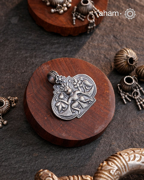 Discover the charm of traditional craftsmanship with our Handmade 92.5 Sterling Silver Hanuman Amulet Pendant.Expertly crafted using the thapi (stamp die) technique, this pendant reflects the age-old artistry of India’s tribal communities. Known by various names like Kavach, Mandaliya, Patri, and Kathla, amulet pendants have long been cherished as symbols of passive worship—a way to keep your deity, Kuldevta, or Kuldevi close to your heart. 