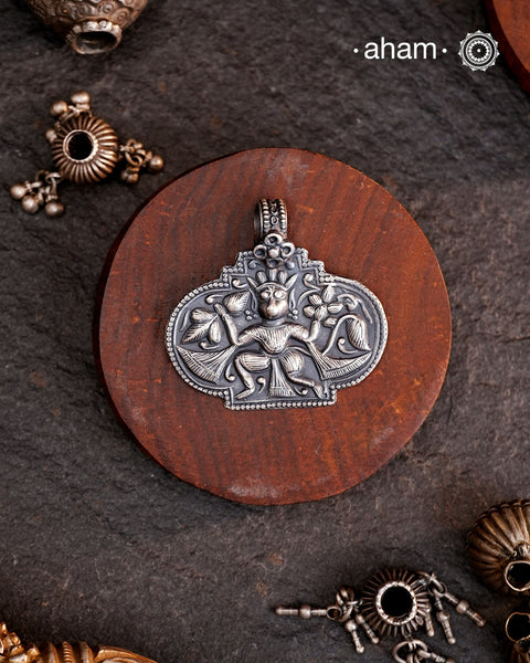 Discover the charm of traditional craftsmanship with our Handmade 92.5 Sterling Silver Hanuman Amulet Pendant.Expertly crafted using the thapi (stamp die) technique, this pendant reflects the age-old artistry of India’s tribal communities. Known by various names like Kavach, Mandaliya, Patri, and Kathla, amulet pendants have long been cherished as symbols of passive worship—a way to keep your deity, Kuldevta, or Kuldevi close to your heart. 