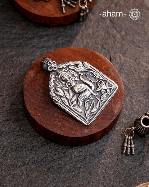 Discover the charm of traditional craftsmanship with our Handmade 92.5 Sterling Silver Lord Kartikeyan Amulet Pendant.Expertly crafted using the thapi (stamp die) technique, this pendant reflects the age-old artistry of India’s tribal communities. Known by various names like Kavach, Mandaliya, Patri, and Kathla, amulet pendants have long been cherished as symbols of passive worship—a way to keep your deity, Kuldevta, or Kuldevi close to your heart. 