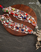 Beautiful handcrafted tribal silver amulet pendant with hanging Ghunroos. Comes with stunning kutchi vintage beadwork that has been restored.