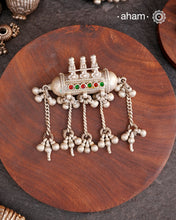 Beautiful handcrafted tribal silver amulet pendant with hanging Ghunroos. A piece from a bygone area, that bring back memories and stories of that time. Wear it with a long chain or with a black thread, or layer them to create a distinct look.