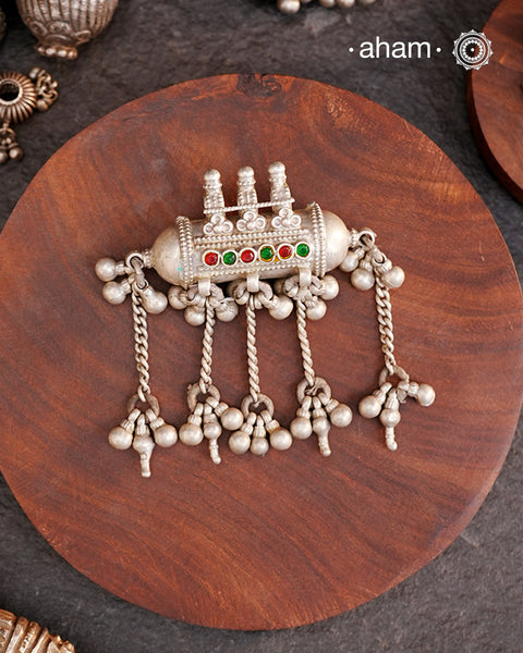 Beautiful handcrafted tribal silver amulet pendant with hanging Ghunroos. A piece from a bygone area, that bring back memories and stories of that time. Wear it with a long chain or with a black thread, or layer them to create a distinct look.